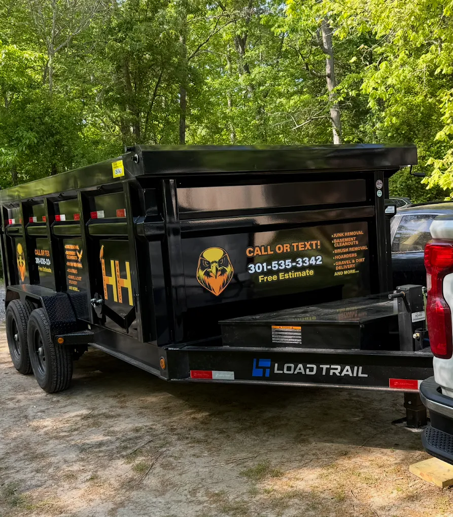 Hauling Hawk dump trailer ready for junk removal in Maryland